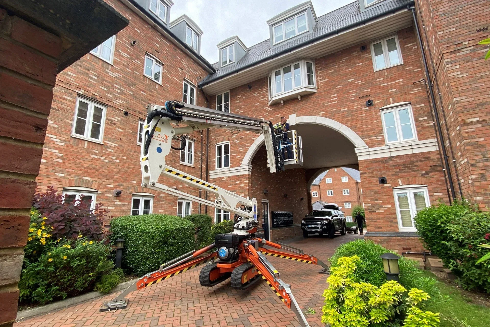 Spider cherry picker at residential property
